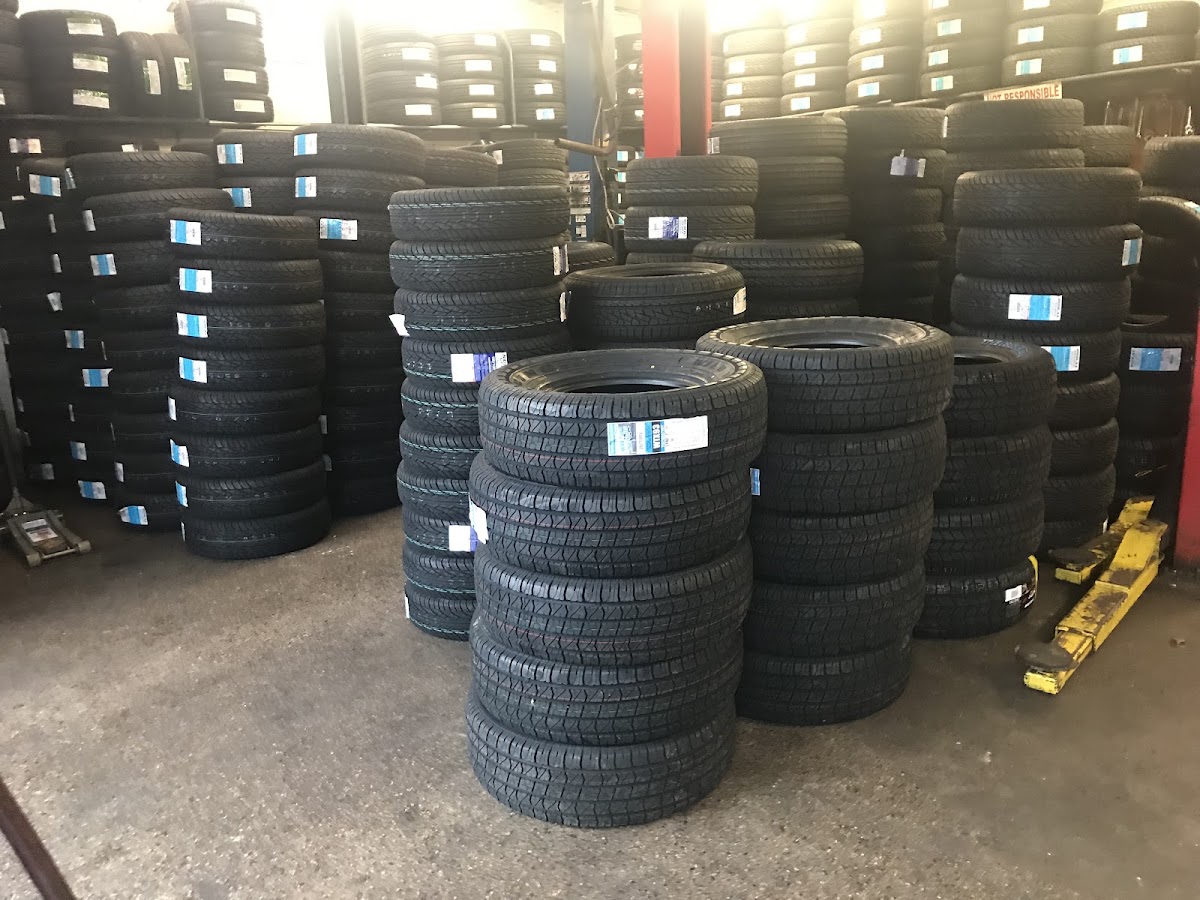 Stacks of new tires in inventory inside BB Hudson Tires